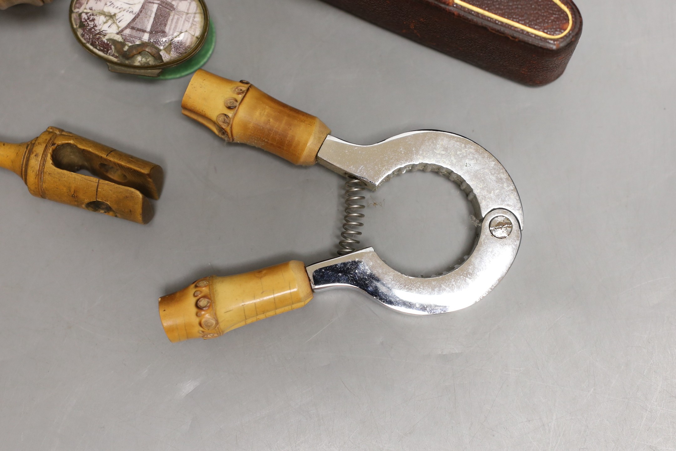 A boxwood spinning top, cased set of scissors, oval patch box and boxed Asprey